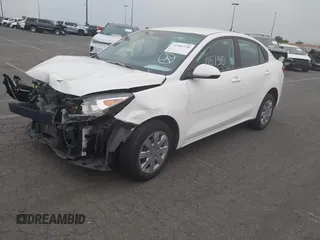 2021 Kia Rio LX with VIN 3KPA24AD3ME422560, listed as a IAAI auction lot 41005730 with 59,206 mi miles. Bid and sale history available at carsss.com. Image 2.