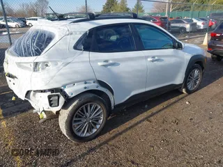 2021 Hyundai Kona SEL with VIN KM8K22AAXMU647635, listed as a IAAI auction lot 41656838 with 36,470 mi miles and . Bid and sale history available at DreamBid. Image 4.