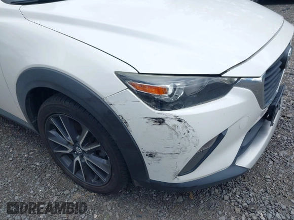 2018 Mazda CX-3 Touring with VIN JM1DKFC71J0315074, listed as a IAAI auction lot 42029790 with 100,268 mi miles. Bid and sale history available at carsss.com. Image 6.
