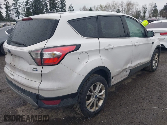 2017 Ford Escape SE z VIN 1FMCU9G95HUA24739, wystawiony jako IAAI lot #41880800 z przebiegiem 164 285 mil mil oraz . Historia ofert i sprzedaży dostępna na DreamBid. Obrazek 4.