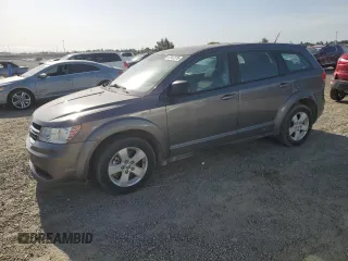 2013 Dodge Journey American Value z VIN 3C4PDCAB8DT590509, wystawiony jako Copart lot #57347375 z przebiegiem 203 642 mil mil oraz Czysty tytuł • Clean title. Historia ofert i sprzedaży dostępna na DreamBid. Obrazek 1.