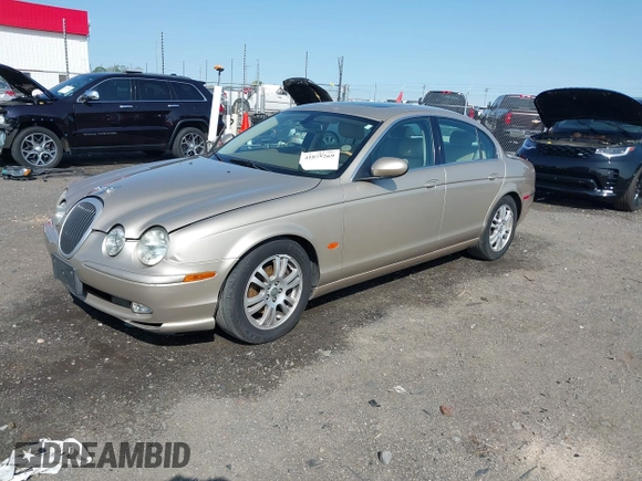 2005 Jaguar S-Type with VIN SAJWA01T95FN22745, listed as a IAAI auction lot 41898269 with 57,614 mi miles and . Bid and sale history available at DreamBid. Image 17.