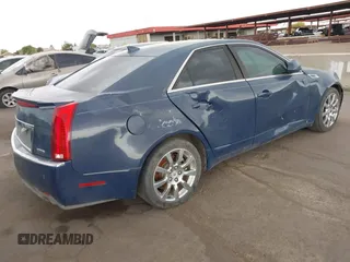 2009 Cadillac CTS RWD w/1SB with VIN 1G6DV57V690111847, listed as a IAAI auction lot 42189418 with 144,790 mi miles. Bid and sale history available at carsss.com. Image 4.