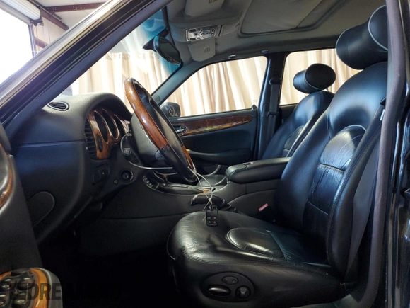 2001 Jaguar XJ with VIN SAJDA25B01MF26440, listed as a Copart auction lot 83933224 with 124,873 mi miles and Clean Title. Bid and sale history available at DreamBid. Image 7.