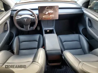 2024 Tesla Model Y Performance with VIN 7SAYGDEF2RF113873, listed as a Copart auction lot 46181915 with 19,625 mi miles and Salvage Title. Bid and sale history available at DreamBid. Image 8.