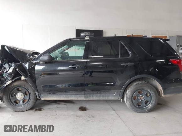 2018 Ford Police Interceptor Utility z VIN 1FM5K8AR5JGB91950, wystawiony jako IAAI lot #41976863 z przebiegiem Nie podano mil oraz . Historia ofert i sprzedaży dostępna na DreamBid. Obrazek 14.