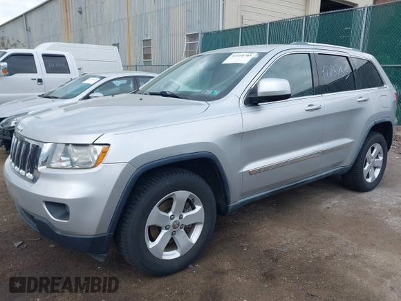 2011 Jeep Grand Cherokee Laredo with VIN 1J4RR4GG0BC622732, listed as a IAAI auction lot 42218785 with 127,186 mi miles and . Bid and sale history available at DreamBid. Image 2.