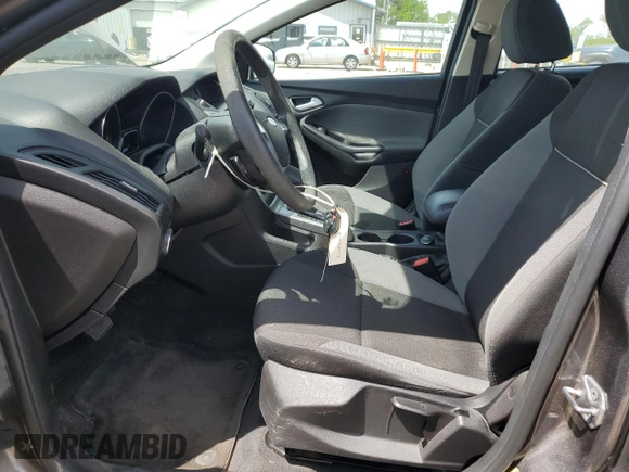 2014 Ford Focus SE z VIN 1FADP3K21EL424134, wystawiony jako Copart lot #56692545 z przebiegiem 46 342 mil mil oraz Szkoda całkowita • Salvage title. Historia ofert i sprzedaży dostępna na DreamBid. Obrazek 7.