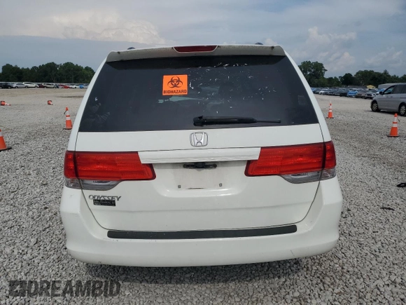 2010 Honda Odyssey EX with VIN 5FNRL3H48AB077659, listed as a Copart auction lot 62373835 with Not provided miles and Salvage title. Bid and sale history available at DreamBid. Image 6.