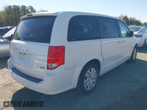 2016 Dodge Grand Caravan SE with VIN 2C4RDGBG2GR114564, listed as a IAAI auction lot 41838735 with 103,348 mi miles and . Bid and sale history available at DreamBid. Image 4.