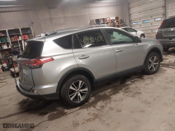 2017 Toyota RAV4 XLE with VIN 2T3RFREV3HW555319, listed as a IAAI auction lot 41946308 with 134,073 mi miles. Bid and sale history available at carsss.com. Image 4.
