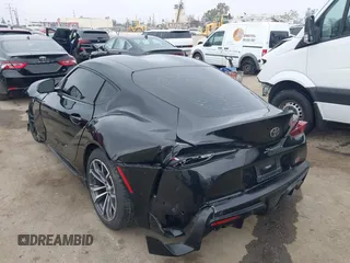 2021 Toyota Supra 2.0 with VIN WZ1DB2C07MW042723, listed as a IAAI auction lot 42635977 with 54,011 mi miles and . Bid and sale history available at DreamBid. Image 3.