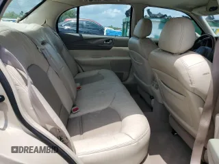 2001 Lincoln Continental z VIN 1LNHM97V91Y622267, wystawiony jako Copart lot #59915445 z przebiegiem 77 070 mil mil oraz Szkoda całkowita • Salvage title. Historia ofert i sprzedaży dostępna na DreamBid. Obrazek 10.