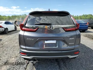 2021 Honda CR-V Touring z VIN 2HKRW2H95MH675002, wystawiony jako Copart lot #57340315 z przebiegiem 41 159 mil mil oraz Szkoda całkowita • Salvage title. Historia ofert i sprzedaży dostępna na DreamBid. Obrazek 6.