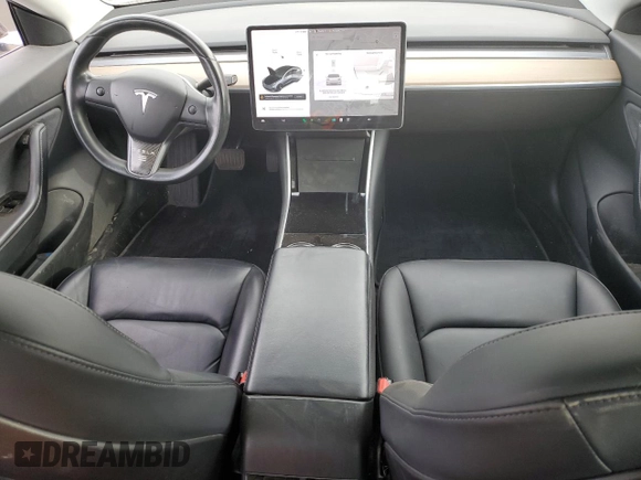 2018 Tesla Model 3 Long Range Battery z VIN 5YJ3E1EB3JF103804, wystawiony jako Copart lot #83752134 z przebiegiem 128 507 mil mil oraz Szkoda całkowita • Salvage title. Historia ofert i sprzedaży dostępna na DreamBid. Obrazek 8.