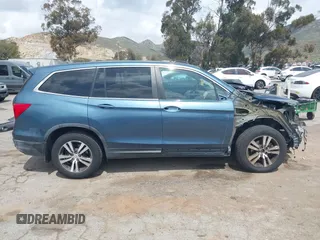 2016 Honda Pilot EX-L with VIN 5FNYF5H53GB028711, listed as a IAAI auction lot 41916433 with 162,895 mi miles and . Bid and sale history available at DreamBid. Image 14.