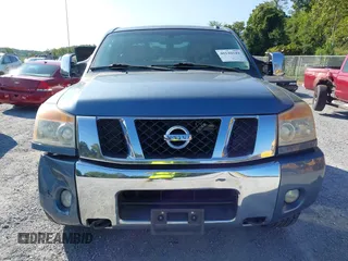 2011 Nissan Titan SL with VIN 1N6AA0EC7BN310833, listed as a IAAI auction lot 40140349 with 230,235 mi miles. Bid and sale history available at carsss.com. Image 13.