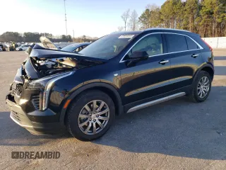 2020 Cadillac XT4 FWD Premium Luxury with VIN 1GYFZCR44LF056476, listed as a Copart auction lot 43559495 with 51,076 mi miles and Salvage Title. Bid and sale history available at carsss.com. Image 1.