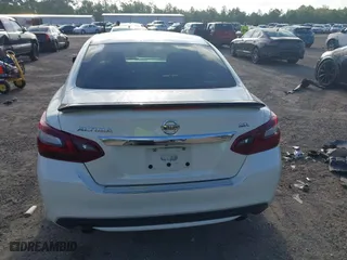 2017 Nissan Altima 2.5 SR with VIN 1N4AL3AP4HC231332, listed as a IAAI auction lot 41966946 with 151,015 mi miles. Bid and sale history available at carsss.com. Image 15.