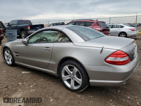 2009 Mercedes-Benz SL 550 with VIN WDBSK71F49F143492, listed as a Copart auction lot 88757425 with 89,117 mi miles and Salvage title. Bid and sale history available at DreamBid. Image 2.