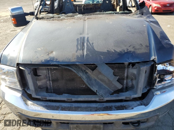 2000 Ford F-350 XL z VIN 1FTWW33F3YED40123, wystawiony jako Copart lot #79572484 z przebiegiem Nie podano mil oraz Nie do naprawy • Non repairable. Historia ofert i sprzedaży dostępna na DreamBid. Obrazek 11.