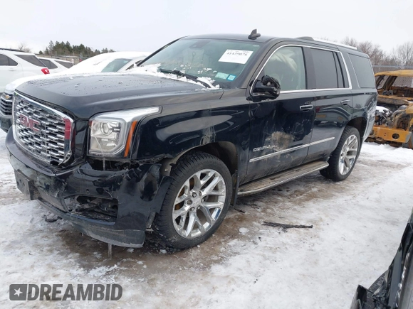 2020 GMC Yukon Denali with VIN 1GKS2CKJ5LR301216, listed as a IAAI auction lot 41439076 with 76,129 mi miles. Bid and sale history available at carsss.com. Image 2.
