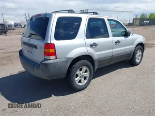 2005 Ford Escape XLT with VIN 1FMYU931X5KB49605, listed as a IAAI auction lot 42162371 with 153,816 mi miles and . Bid and sale history available at DreamBid. Image 4.