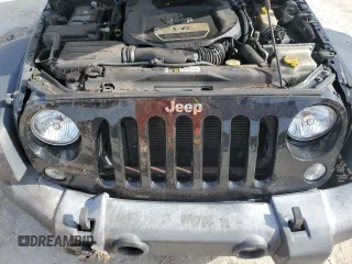 2016 Jeep Wrangler Unlimited Rubicon with VIN 1C4BJWFG7GL320650, listed as a Copart auction lot 53900195 with 77,620 mi miles and Salvage title. Bid and sale history available at DreamBid. Image 11.