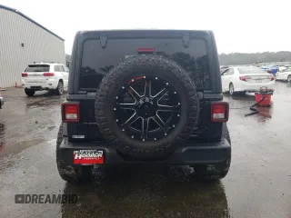2021 Jeep Wrangler Unlimited Sport Altitude with VIN 1C4HJXDN5MW525525, listed as a Copart auction lot 55897605 with 54,554 mi miles and Salvage title. Bid and sale history available at DreamBid. Image 6.