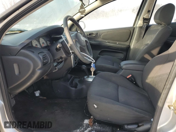 2003 Dodge Neon SXT with VIN 1B3ES56C33D182774, listed as a Copart auction lot 89039415 with 86,597 mi miles and Salvage Title. Bid and sale history available at carsss.com. Image 7.