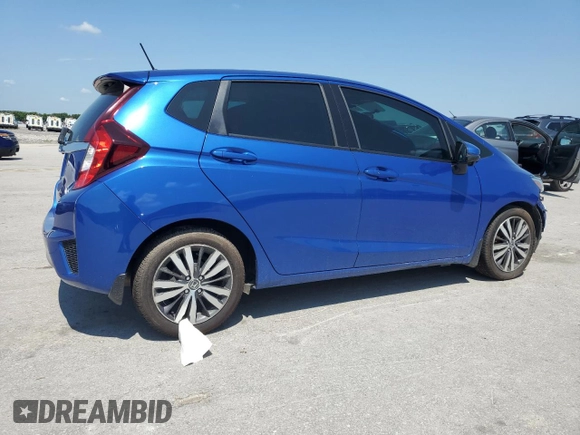 2015 Honda Fit EX-L with VIN 3HGGK5H83FM745753, listed as a Copart auction lot 61916175 with 76,305 mi miles and Salvage title. Bid and sale history available at DreamBid. Image 3.