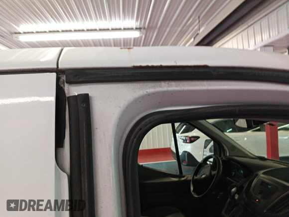 2016 Ford Transit Cargo z VIN 1FTYE1YM8GKB19172, wystawiony jako IAAI lot #42788511 z przebiegiem 143 978 mil mil oraz . Historia ofert i sprzedaży dostępna na DreamBid. Obrazek 17.