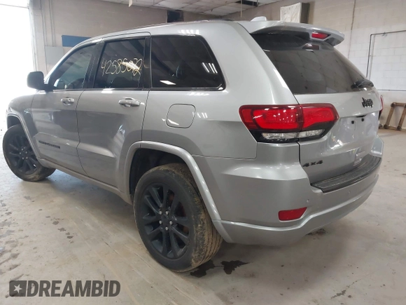 2018 Jeep Grand Cherokee Laredo E with VIN 1C4RJFAG7JC203793, listed as a IAAI auction lot 42585072 with 263,987 mi miles and . Bid and sale history available at DreamBid. Image 3.