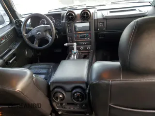 2006 Hummer H2 with VIN 5GRGN22U56H105928, listed as a Copart auction lot 76692904 with 0 mi miles and Salvage Title. Bid and sale history available at carsss.com. Image 8.