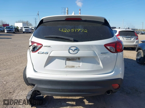2014 Mazda CX-5 Sport with VIN JM3KE2BE8E0301175, listed as a IAAI auction lot 42051972 with 121,821 mi miles and . Bid and sale history available at carsss.com. Image 16.