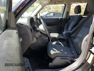 2015 Jeep Patriot Latitude with VIN 1C4NJPFB3FD377959, listed as a Copart auction lot 57914755 with 106,704 mi miles and Salvage title. Bid and sale history available at DreamBid. Image 7.