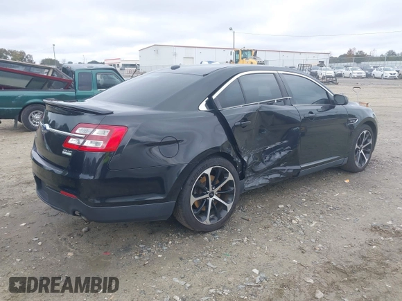2015 Ford Taurus SHO with VIN 1FAHP2KT7FG148444, listed as a IAAI auction lot 40788614 with 121,533 mi miles and . Bid and sale history available at DreamBid. Image 4.