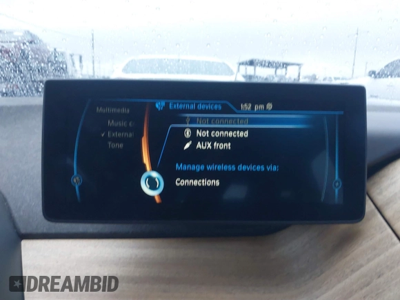 2014 BMW i3 with VIN WBY1Z4C58EV276329, listed as a IAAI auction lot 41570602 with 87,925 mi miles and . Bid and sale history available at DreamBid. Image 14.