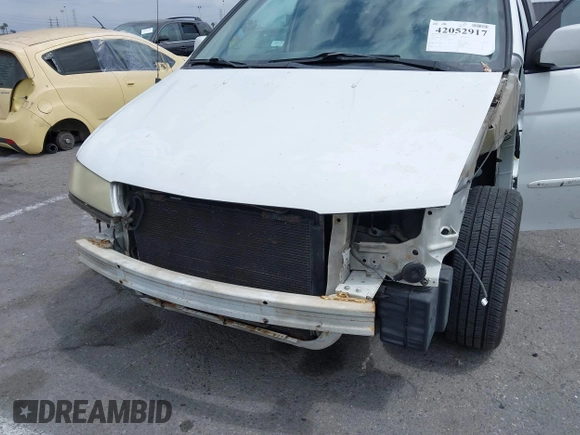 2003 Honda Odyssey EX-L with VIN 5FNRL18973B113215, listed as a IAAI auction lot 42052917 with Not Provided miles and . Bid and sale history available at DreamBid. Image 6.
