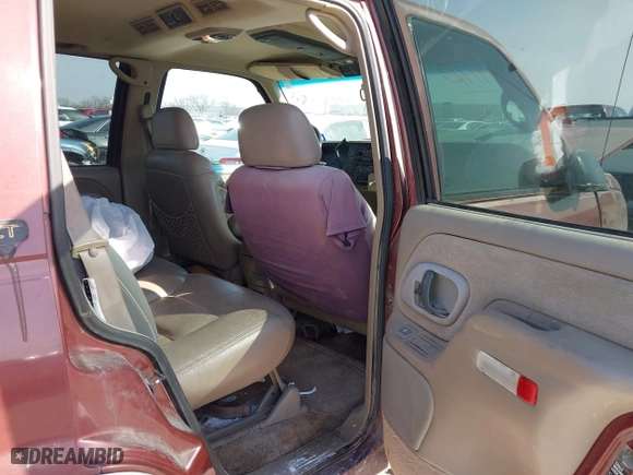 1999 Chevrolet Tahoe with VIN 1GNEC13R9XJ341261, listed as a IAAI auction lot 41741710 with 234,676 mi miles. Bid and sale history available at carsss.com. Image 8.
