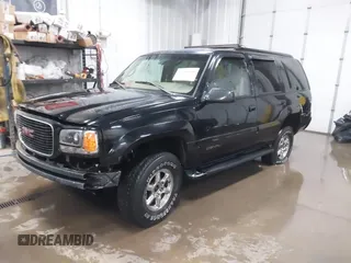 2000 GMC Denali with VIN 1GKEK13R9YR163824, listed as a IAAI auction lot 41245808 with 206,773 mi miles. Bid and sale history available at carsss.com. Image 19.