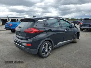 2018 Chevrolet Bolt EV Premier with VIN 1G1FX6S09J4122445, listed as a Copart auction lot 55230635 with 33,569 mi miles and Salvage title. Bid and sale history available at DreamBid. Image 3.