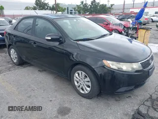2012 Kia Forte EX with VIN KNAFU4A28C5490102, listed as a IAAI auction lot 42164395 with 167,444 mi miles. Bid and sale history available at carsss.com. Image 1.