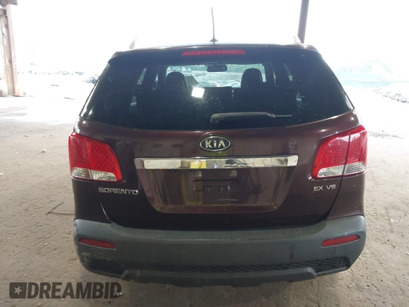 2012 Kia Sorento EX z VIN 5XYKU4A25CG304508, wystawiony jako IAAI lot #42461847 z przebiegiem 20 016 mil mil oraz . Historia ofert i sprzedaży dostępna na DreamBid. Obrazek 16.