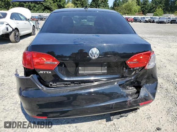 2014 Volkswagen Jetta SE z VIN 3VWD17AJ2EM397825, wystawiony jako Copart lot #64076595 z przebiegiem 61 691 mil mil oraz Szkoda całkowita • Salvage title. Historia ofert i sprzedaży dostępna na DreamBid. Obrazek 6.