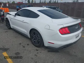 2021 Ford Mustang GT with VIN 1FA6P8CF5M5115597, listed as a IAAI auction lot 42142619 with 101,687 mi miles and . Bid and sale history available at DreamBid. Image 3.