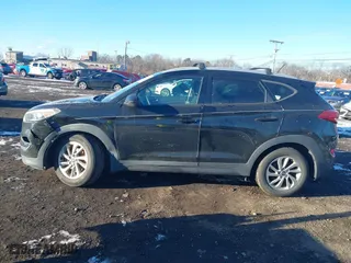 2016 Hyundai Tucson SE with VIN KM8J3CA42GU076476, listed as a IAAI auction lot 41272580 with 112,010 mi miles. Bid and sale history available at carsss.com. Image 14.
