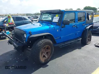 2015 Jeep Wrangler Unlimited Sport with VIN 1C4BJWDG1FL716400, listed as a IAAI auction lot 42645745 with 83,199 mi miles and . Bid and sale history available at DreamBid. Image 18.