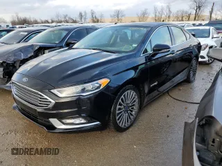 2018 Ford Fusion Hybrid Titanium with VIN 3FA6P0RU5JR120394, listed as a Copart auction lot 73557602 with 148,870 mi miles. Bid and sale history available at carsss.com. Image 1.