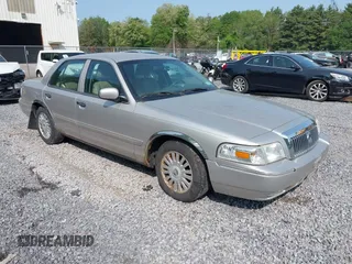2008 Mercury Grand Marquis LS z VIN 2MEHM75V18X615138, wystawiony jako IAAI lot #42404567 z przebiegiem 156 502 mil mil oraz . Historia ofert i sprzedaży dostępna na DreamBid. Obrazek 1.